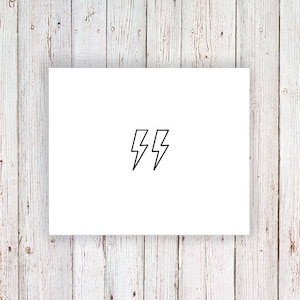May include: A white card with two black lightning bolt symbols.