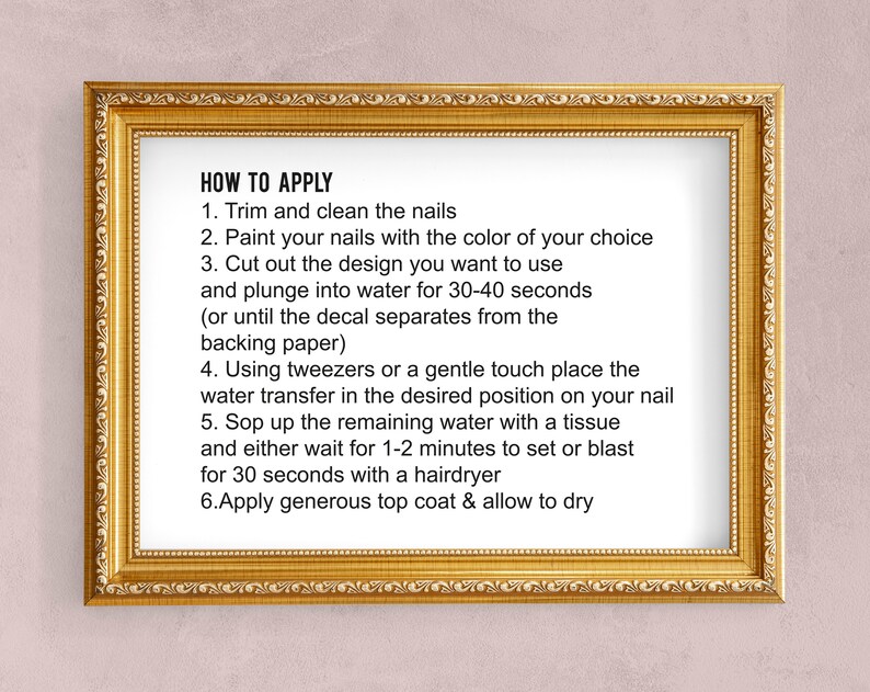 May include: A framed image with instructions on how to apply nail decals. The instructions include steps like trimming nails, painting them, cutting out the design, and soaking the decal in water for 30-40 seconds.