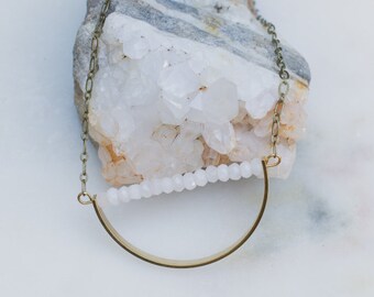 The Harper: moonstone jade and raw brass statement necklace