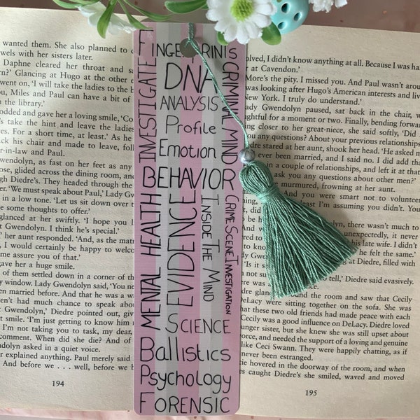 A forensic science and Psychology bookmark with tassel