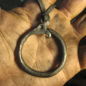 A hand forged Ouroboros/ Midgård/World serpent pendant . Comes supplied with a high quality elk leather thread. image 2