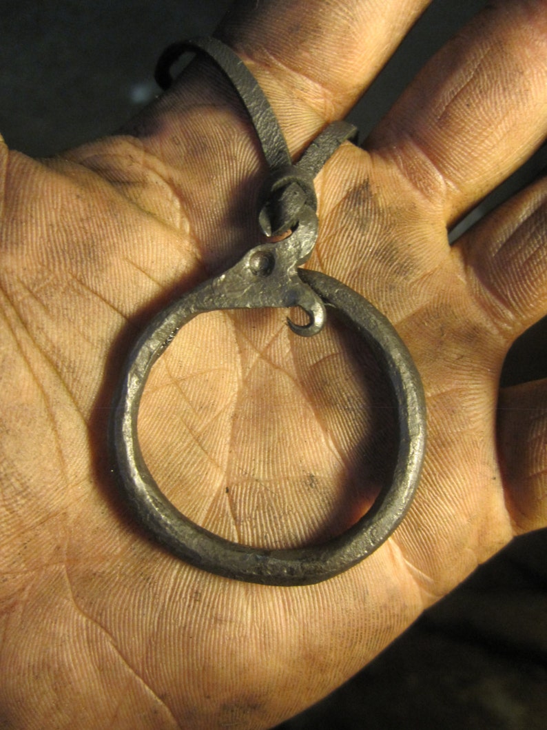 A hand forged Ouroboros/ Midgård/World serpent pendant . Comes supplied with a high quality elk leather thread. image 2