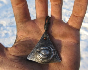 Hand forged "All seeing eye" pendant. Comes supplied with a high quality elk leather cord.