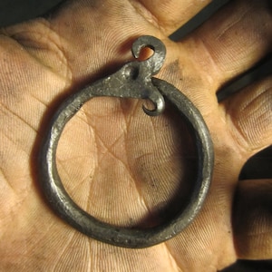 A hand forged Ouroboros/ Midgård/World serpent pendant . Comes supplied with a high quality elk leather thread. image 3