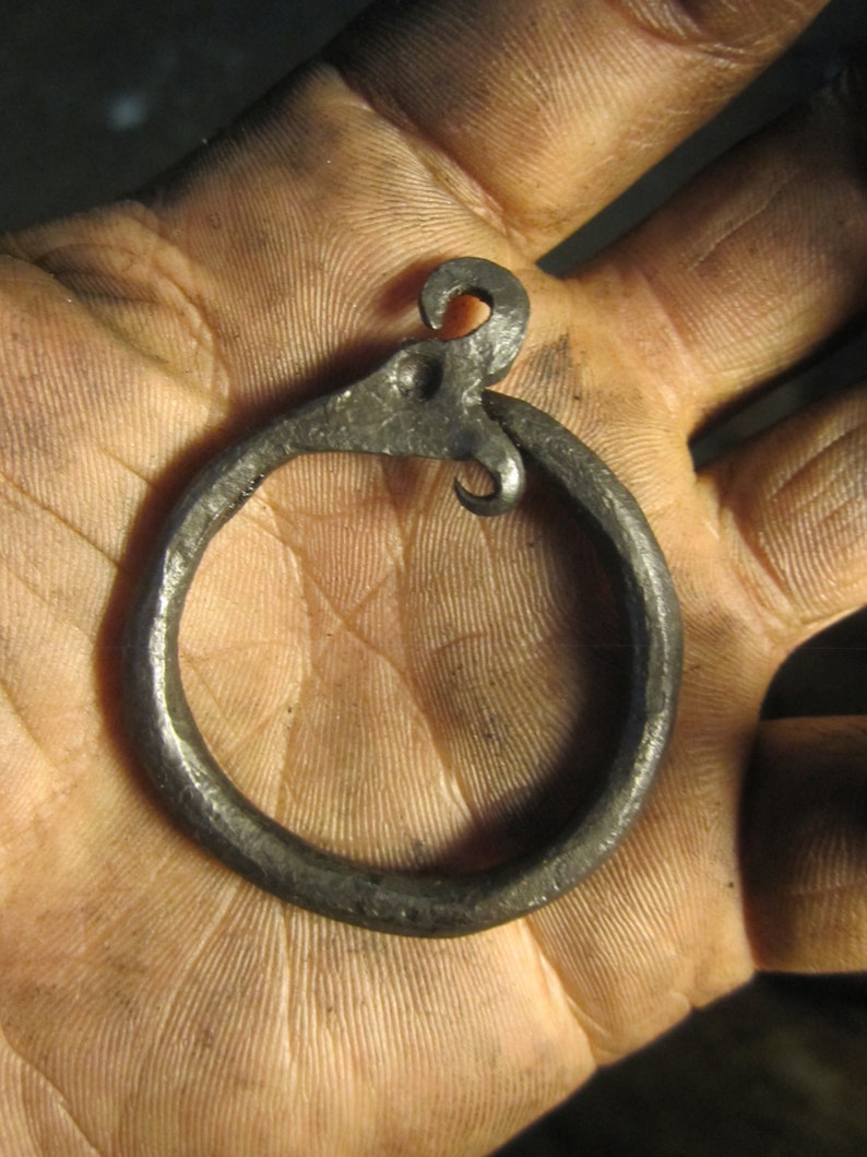 A hand forged Ouroboros/ Midgård/World serpent pendant . Comes supplied with a high quality elk leather thread. image 3