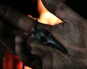 Hand forged raven skull pendant