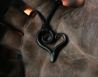 A hand forged Heart pendant . Comes supplied with a high quality elk leather thread.