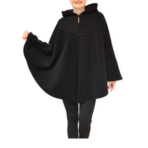 May include: A black hooded cape with a long, flowing design. The cape has a simple, elegant style and is made of a soft, comfortable fabric.