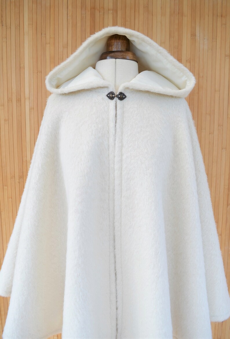 white cloak with hood and sleeves
