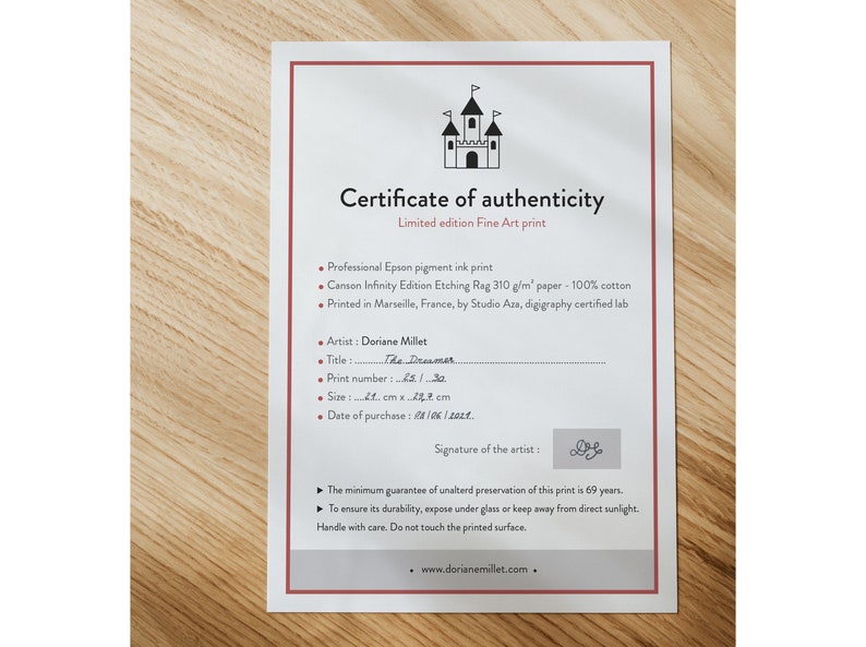May include: A certificate of authenticity for a limited edition fine art print of "The Dreamer" by artist Doriane Millet. The certificate is printed on Canson Infinity Edition Etching Rag paper and includes the artist's signature.