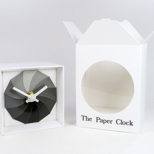 White Paper Clock modern design gift item with accurate quartz movement, and shades of gray colored face. image 3