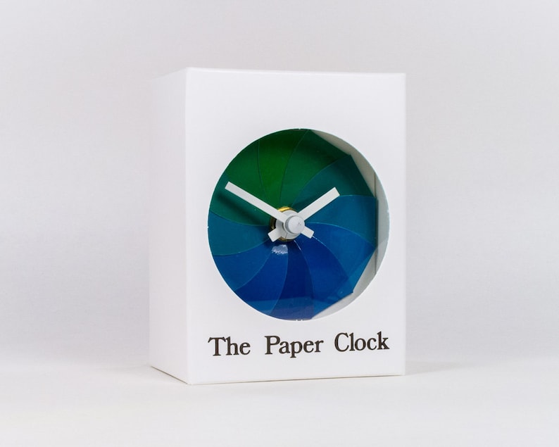 White Paper Clock modern design gift item with accurate quartz movement, and blue/green colored face. image 1