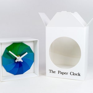 White Paper Clock modern design gift item with accurate quartz movement, and blue/green colored face. image 3