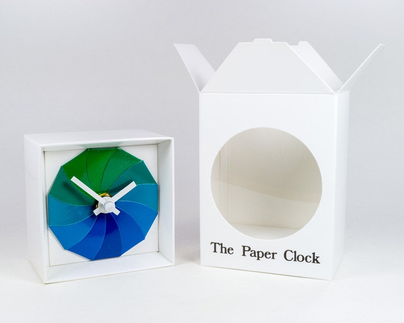 White Paper Clock modern design gift item with accurate quartz movement, and blue/green colored face. image 3