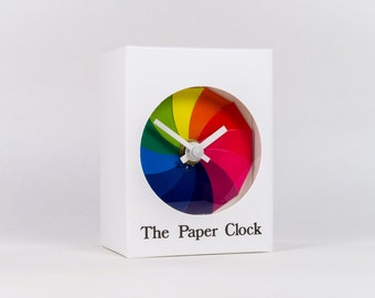 White Paper Clock modern design gift item with accurate quartz movement, and rainbow colored face.