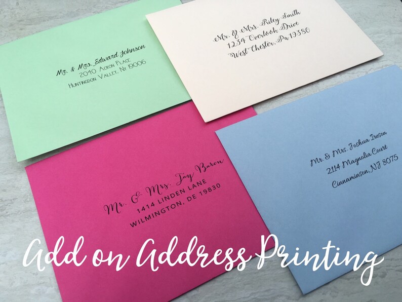 May include: Four envelopes with different colored paper and handwritten addresses. The envelopes are on a light gray surface. The text on the envelopes reads: "Mr. & Mrs. Edward Johnson, 2040 Acron Place, Huntingdon Valley, Nr 19006", "Mr. & Mrs. Riley Smith, 1234 Overlook Drive, West Chester, Pa 19350", "Mr. & Mrs. Jay Baren, 1414 Linden Lane, Wilmington, DE 19830", and "Mr. & Mrs. Joshua Treesn, 2114 Magnolia Court, Cinnaminson, NJ 8075".