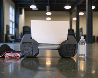 Bold, gym-inspired touch to your desk with this 35lb Dumbbell Business Card Holder