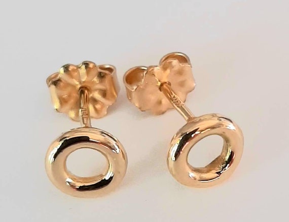 18K Gold Post Earrings. Solid 18K Gold Tiny Donut Style Studs With 18K Gold Ear Nuts.