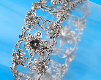1937 - FINLANDE - L.G. Signé - Bracelet floral art déco en argent 813H et marcassites