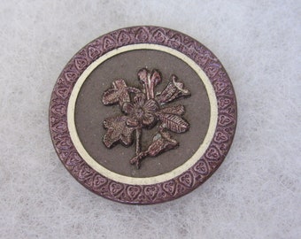 Large antique brass sewing button - pictorial - flowers - original purple tint - Late Victorian era