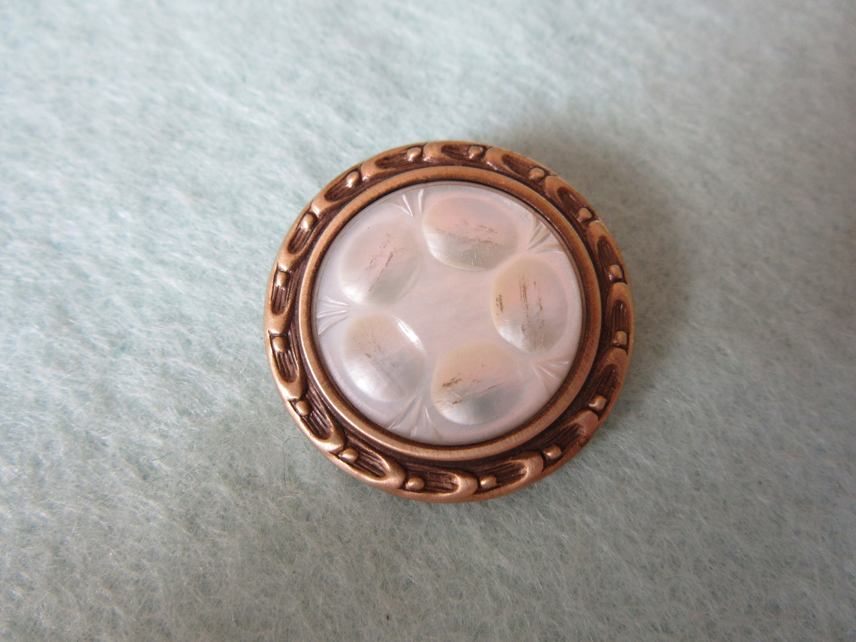 13 Victorian sewing buttons with fancy carved border and brocade