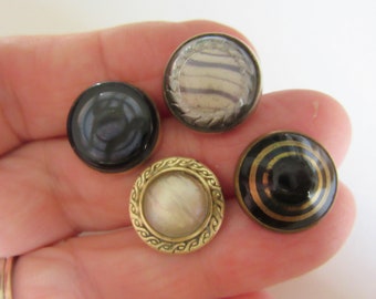 Lot of 4 small antique sewing buttons - glass mounted in metal - design under glass - pretty ones!
