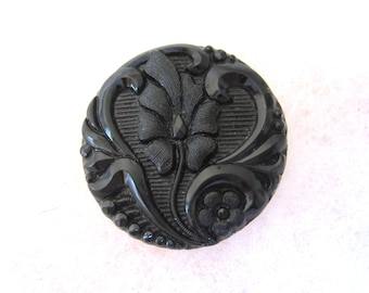 Medium antique black glass sewing button - lacy like - botanical - pretty!