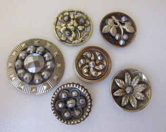 Small collection of 6 antique sewing buttons - openwork, riveted and cut steel - and steel cups - lovely collectibles or components