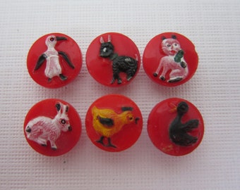 Cute set of 6 small vintage glass kiddie sewing buttons - red with painted animals! amusing!