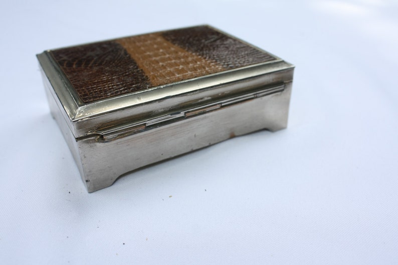 Vintage box with snake leather finishing