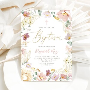 May include: A floral baptism invitation with a gold cross and the text "Join us for the Baptism of our daughter Elizabeth May". The invitation includes the date, time, and location of the baptism.