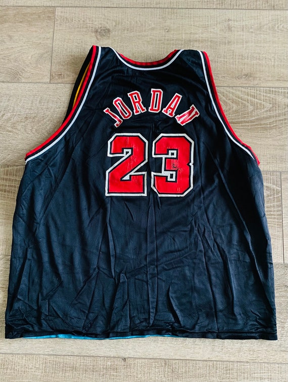 Vintage and Reversible Michael Jordan and Grant Hill Jersey
