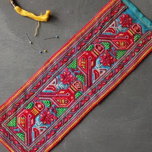 Vintage hill tribe Hmong apron panel from Northern Thailand hand embroidered bird floral cross stitch 17 x 49cm