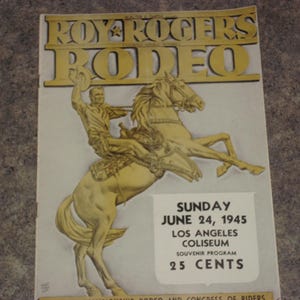 May include: Vintage Roy Rogers Rodeo souvenir program from June 24, 1945, featuring a cowboy on a rearing horse. The program is for the Los Angeles Coliseum event and includes the text "25 CENTS".