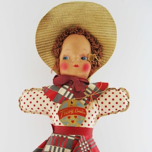 Vintage Oil Cloth Doll With Large Straw Bonnet