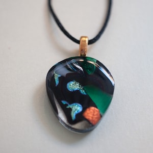 Black, green, and gold iridescent dichroic glass pendant