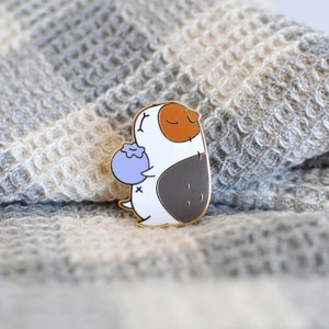 Bluberry and Guinea pig enamel pin