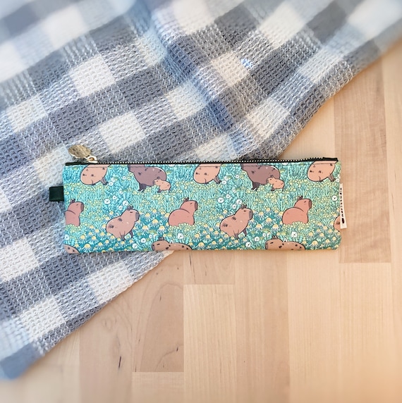 Capybara Zipper Pencil Pouch Case featuring Noristudio Capybara Meadow Pattern