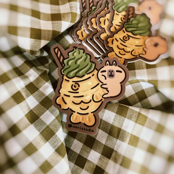 Moonch the Capybara with Taiyaki Ice Cream | Vinyl Sticker Moonch the Capybara with Taiyaki Ice Cream | Vinyl Sticker
