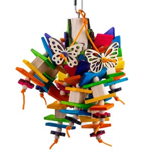May include: A colorful wooden bird toy with two butterfly shapes and beads. The toy is suspended from a metal hook.
