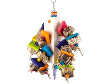 May include: A colorful wooden bird toy with a variety of shapes and textures. The toy is suspended from a white wooden base and features a variety of colors, including red, orange, yellow, green, blue, and purple.