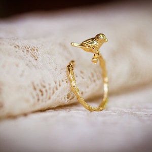 Little birdie on branch adjustable ring
