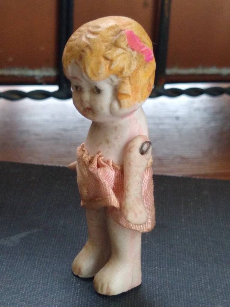 porcelain kewpie doll