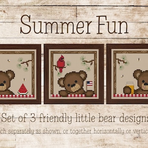 May include: A set of three cross-stitch patterns featuring cute brown bears enjoying summer activities. The first pattern shows a bear with a slice of watermelon, the second shows a bear with a small American flag, and the third shows a bear with a jar of honey. The patterns are titled "Summer Fun" and are available as a set of three.