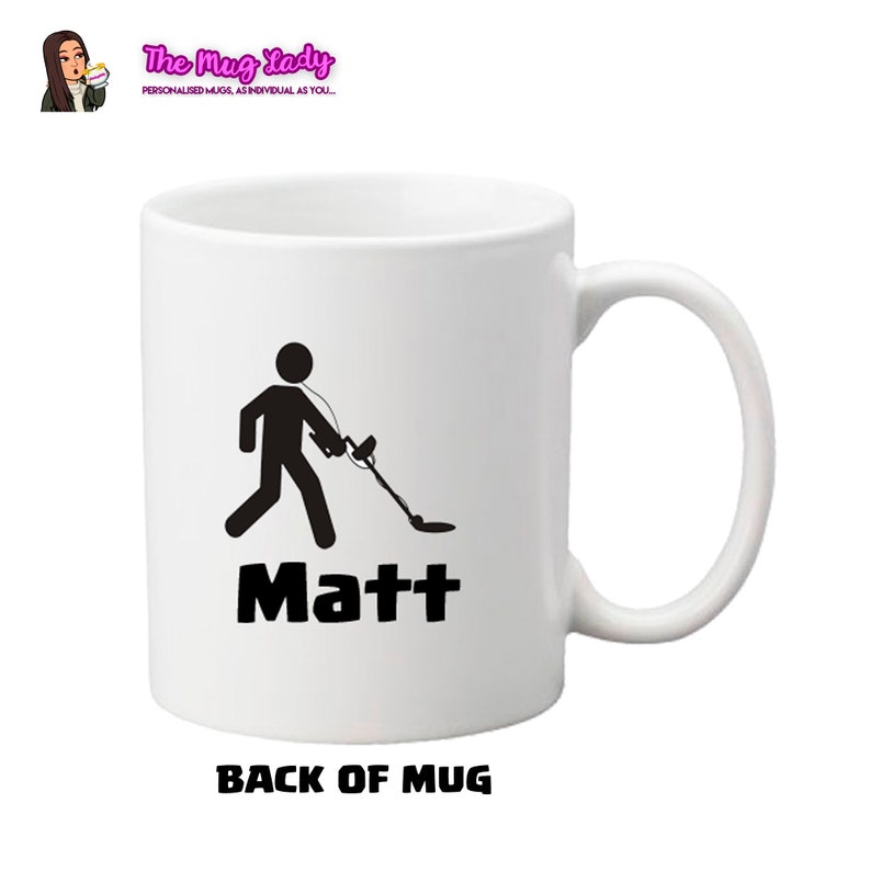 May include: White ceramic mug with a black silhouette of a person using a metal detector. The text "Matt" is printed below the image.