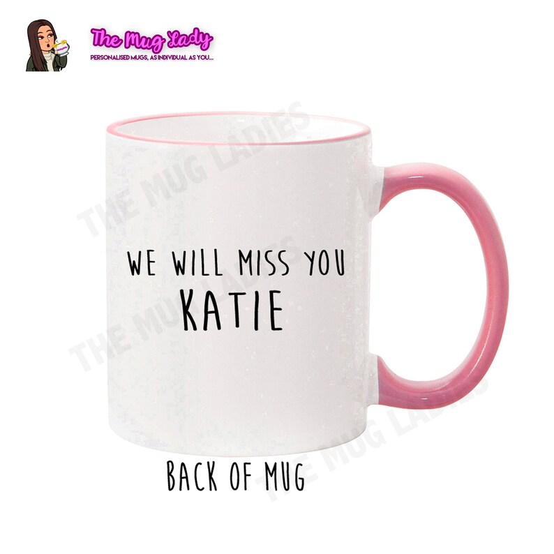 May include: White ceramic mug with a pink rim and handle. The mug has black text that reads "We will miss you Katie".