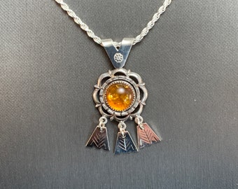 Latvian "Sun" pendant with amber.