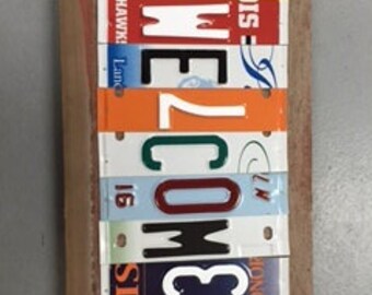 Custom made license plate signs that benefit people with disabilities