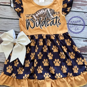 black and gold football dress Sequence black game day dress with gold graphic design football and le   Twinslocedattwo