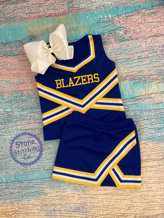 Blue and top gold cheer uniforms